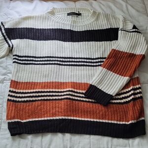 Cream and Black Crewneck Sweater with Ribbed Knit Texture